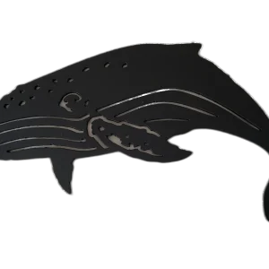 A 21-inch laser-cut, black-painted steel wall art piece featuring a diving humpback whale with detailed cut-outs of fins and tail, set with no background.